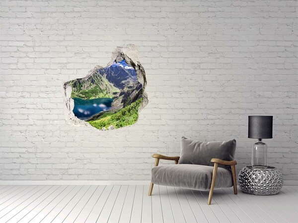 Hole wall sticker Mountain valley with a lake