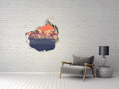 Hole wall sticker Mountains in the glow of sunset