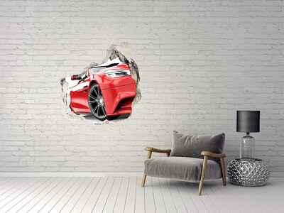 Hole wall sticker Red sports car behind the hole in the wall