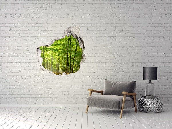Hole in the wall sticker Green forest in the sunlight