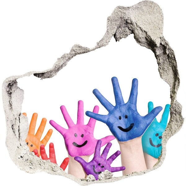 Hole in the wall sticker Joyful hands against the background of concrete