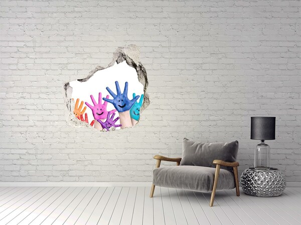 Hole in the wall sticker Joyful hands against the background of concrete