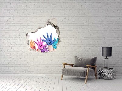 Hole in the wall sticker Joyful hands against the background of concrete