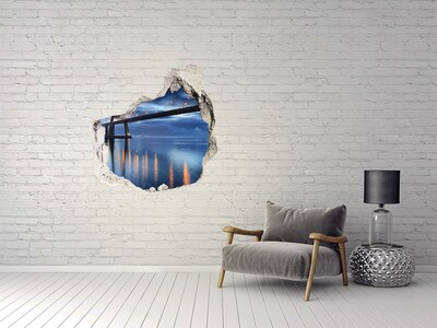 3D wall hole wallpaper A bridge over the water in a night scene