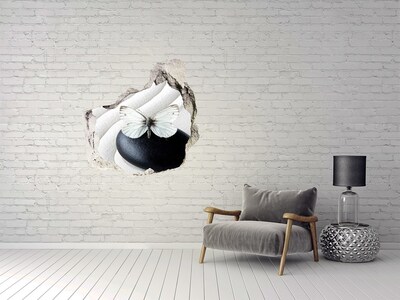 Hole wall sticker A butterfly on a stone in a Zen setting