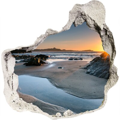 Hole in the wall sticker Sunset over the beach