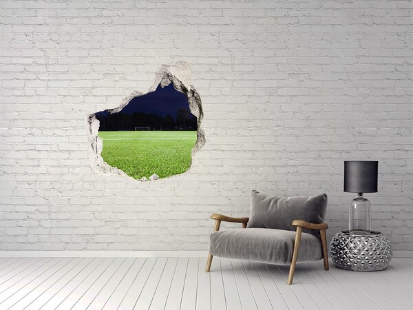 Hole in the wall sticker Football pitch at night