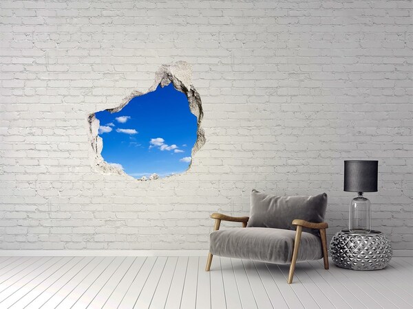 Hole in the wall sticker Blue sky with clouds