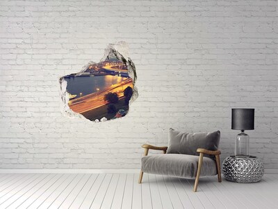 Hole wall sticker View of the city at night
