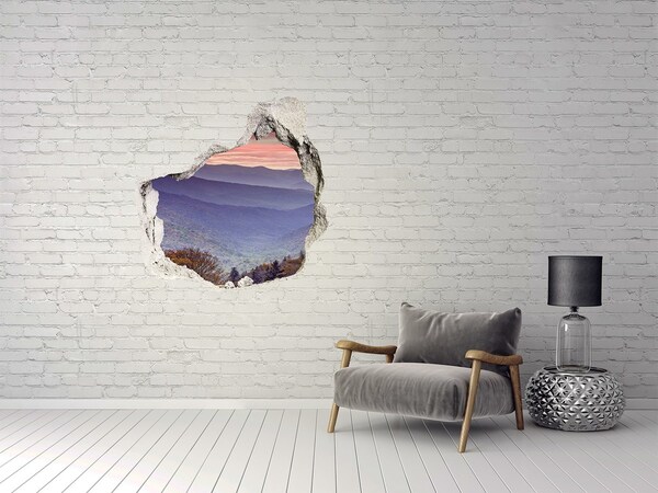 Hole wall sticker Mountain landscape at sunrise
