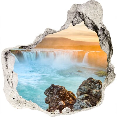 Hole in the wall sticker Waterfall in the setting sun