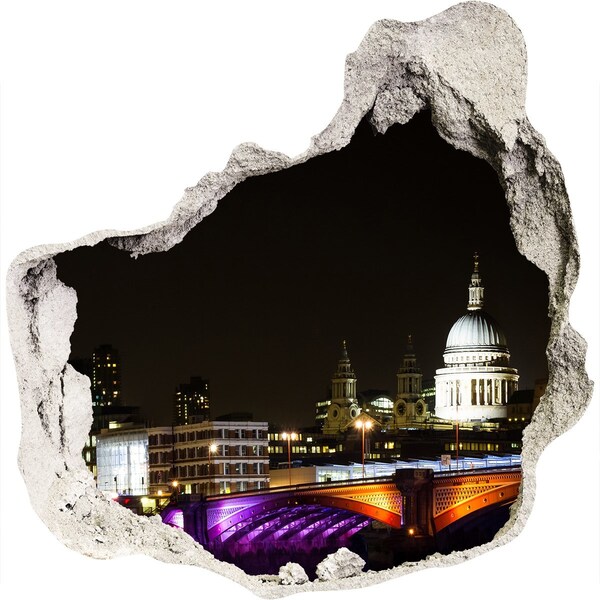 Hole in the wall sticker Night view of London through a hole in the wall