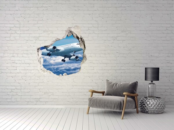 3D wall hole wallpaper Arrival of a plane in the clouds