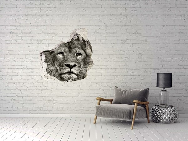Hole in the wall sticker Lion portrait through a hole in the wall