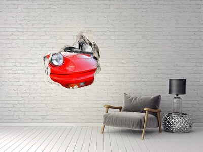 Hole wall sticker Red sports car behind the hole in the wall
