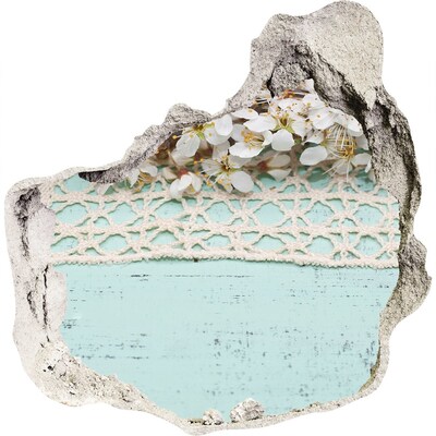 Hole in the wall sticker Floral motif on a blue wood background