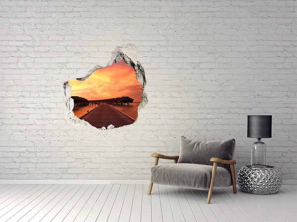 3D wall hole wallpaper Sunset over the water