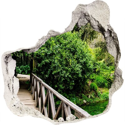 Hole in the wall sticker A green paradise with a wooden bridge