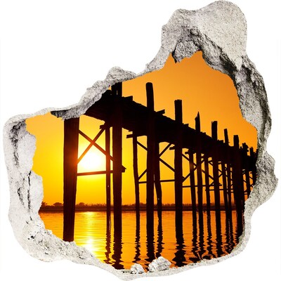 3D wall hole wallpaper Sunset over the pier