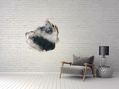 Hole wall sticker Green valley in the clouds
