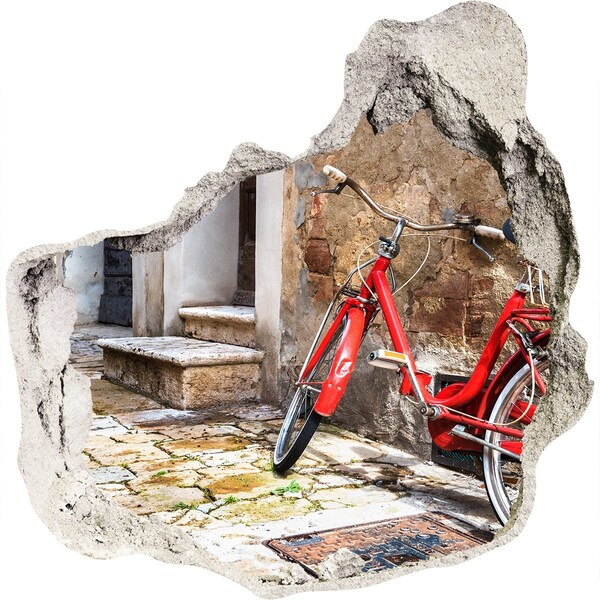Hole in the wall sticker A red bicycle in a charming street
