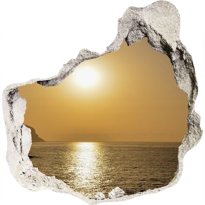 Hole wall sticker Sunset over the sea