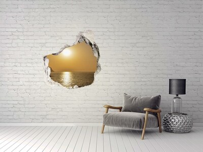 Hole wall sticker Sunset over the sea