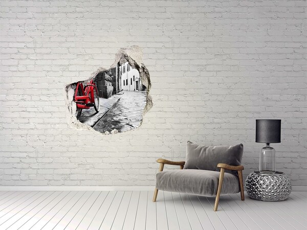 Hole in the wall sticker A red bicycle in a charming street