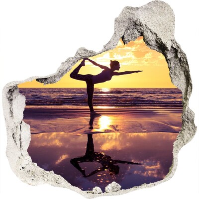 Hole in the wall sticker Yoga on the beach at sunset