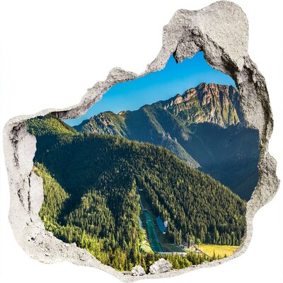 Hole in the wall sticker Mountain landscape with a valley
