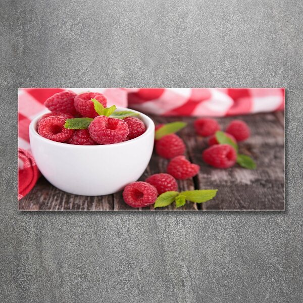 Acrylic print Raspberries in a bowl