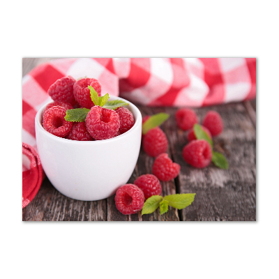 Acrylic print Raspberries in a bowl