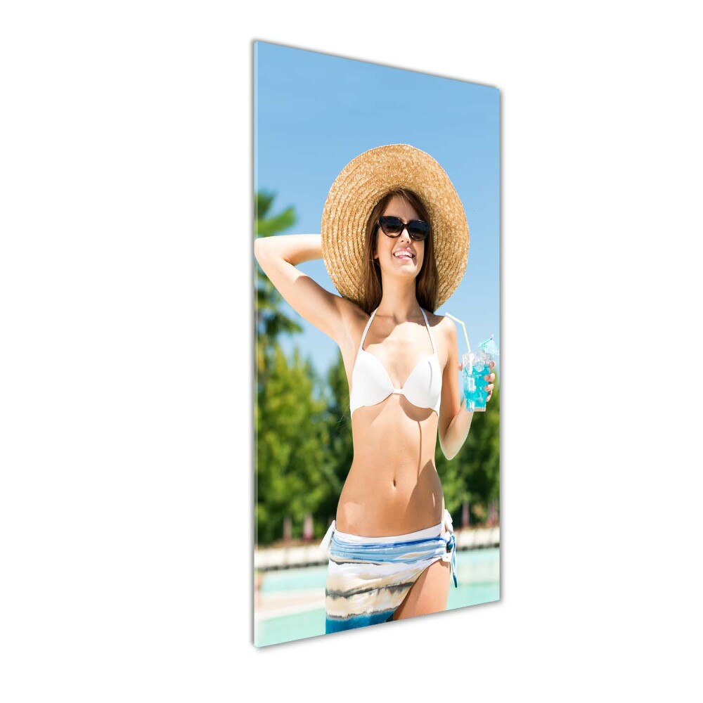 Acrylic glass print A woman over the pool