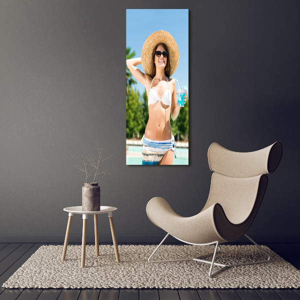 Acrylic glass print A woman over the pool