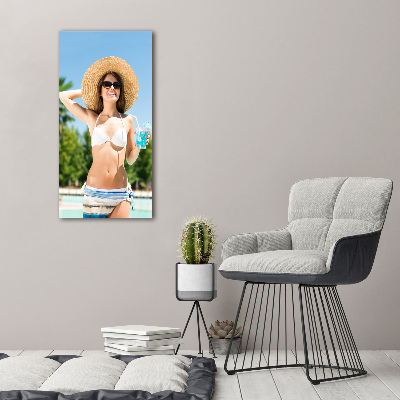 Acrylic glass print A woman over the pool