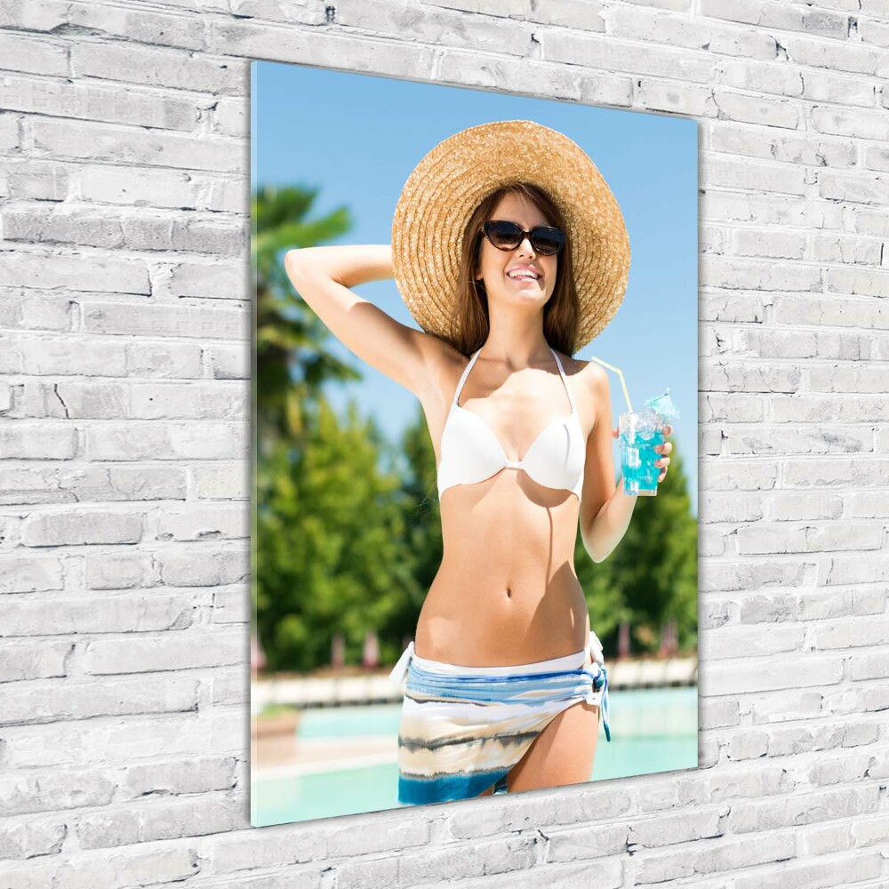 Acrylic glass print A woman over the pool