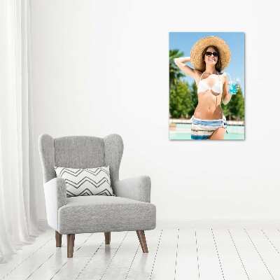 Acrylic glass print A woman over the pool