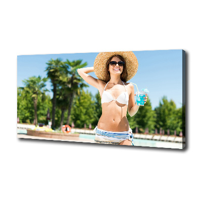 Canvas wall art A woman over the pool