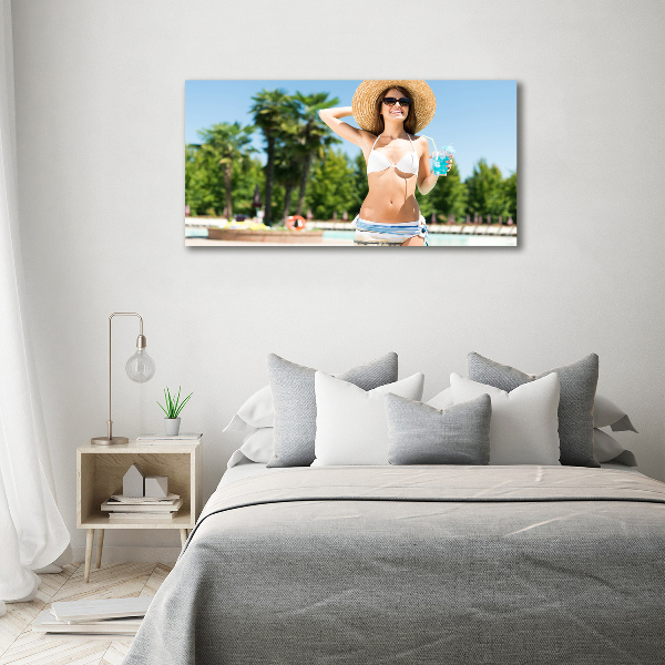 Canvas wall art A woman over the pool