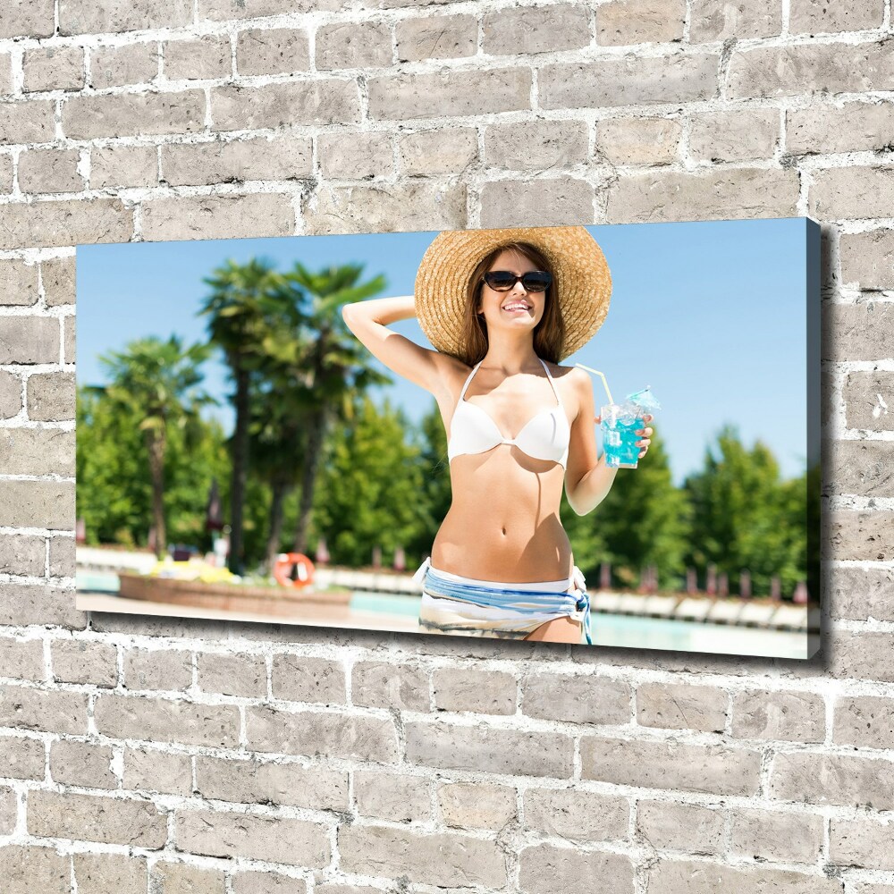 Canvas wall art A woman over the pool