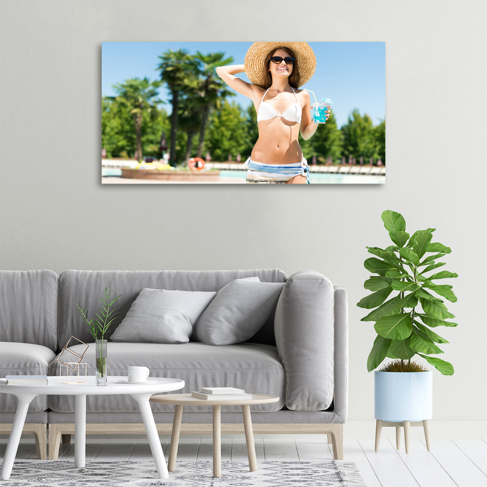 Canvas wall art A woman over the pool