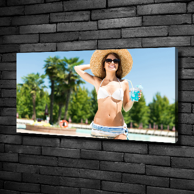 Canvas wall art A woman over the pool