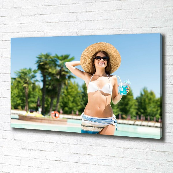 Canvas wall art A woman over the pool