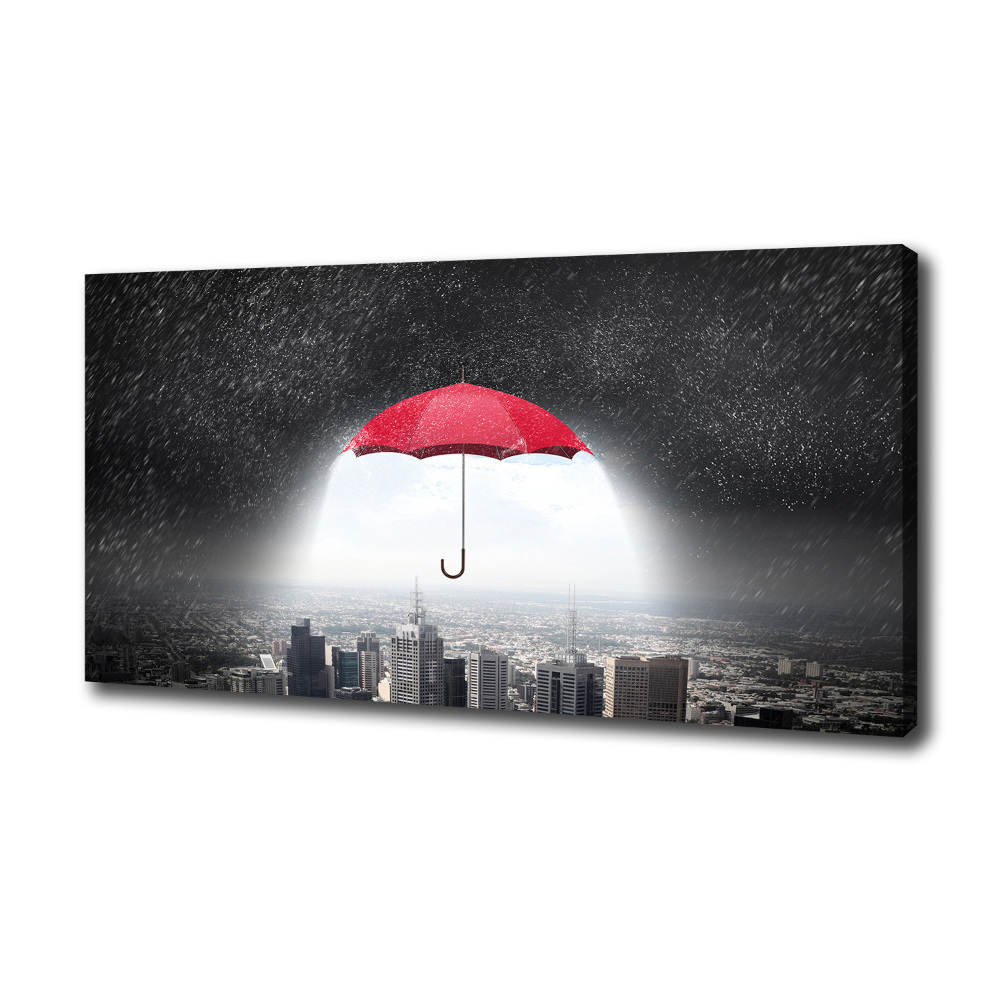 Canvas wall art Umbrella above the city