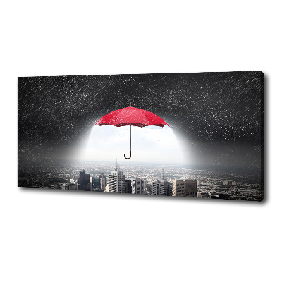 Canvas wall art Umbrella above the city