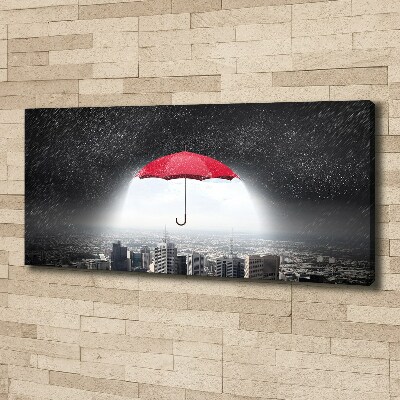 Canvas wall art Umbrella above the city