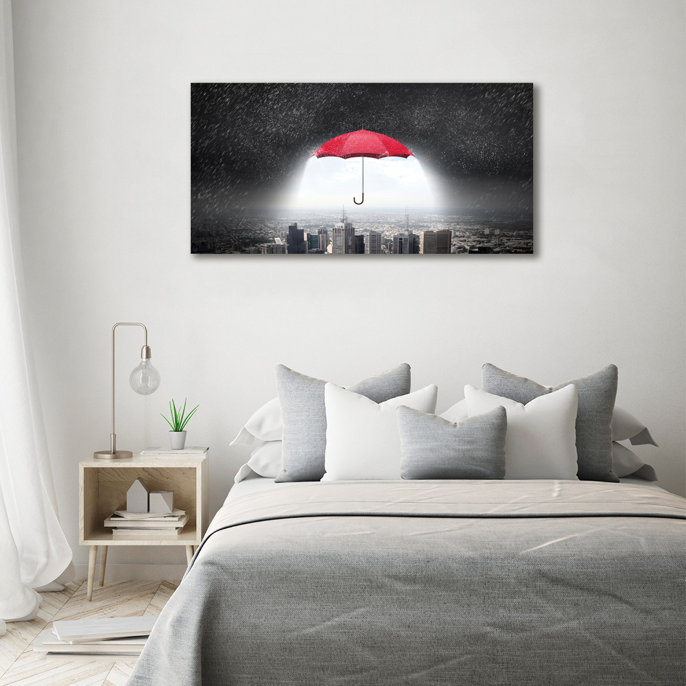 Canvas wall art Umbrella above the city