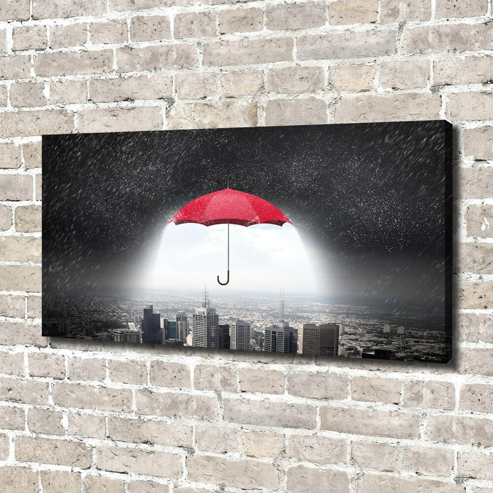 Canvas wall art Umbrella above the city