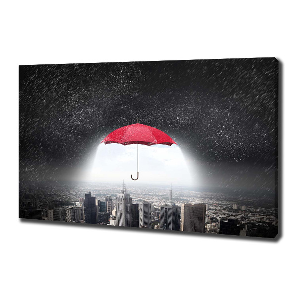 Canvas wall art Umbrella above the city