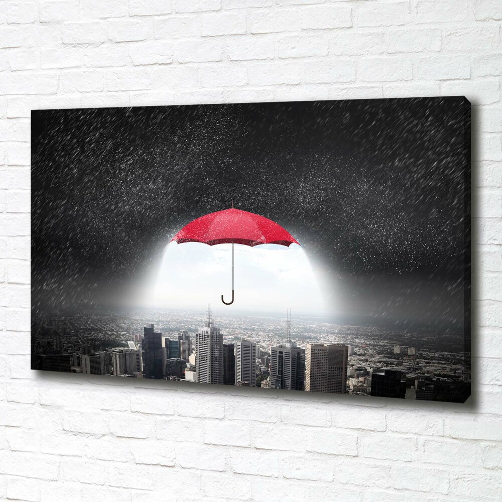 Canvas wall art Umbrella above the city